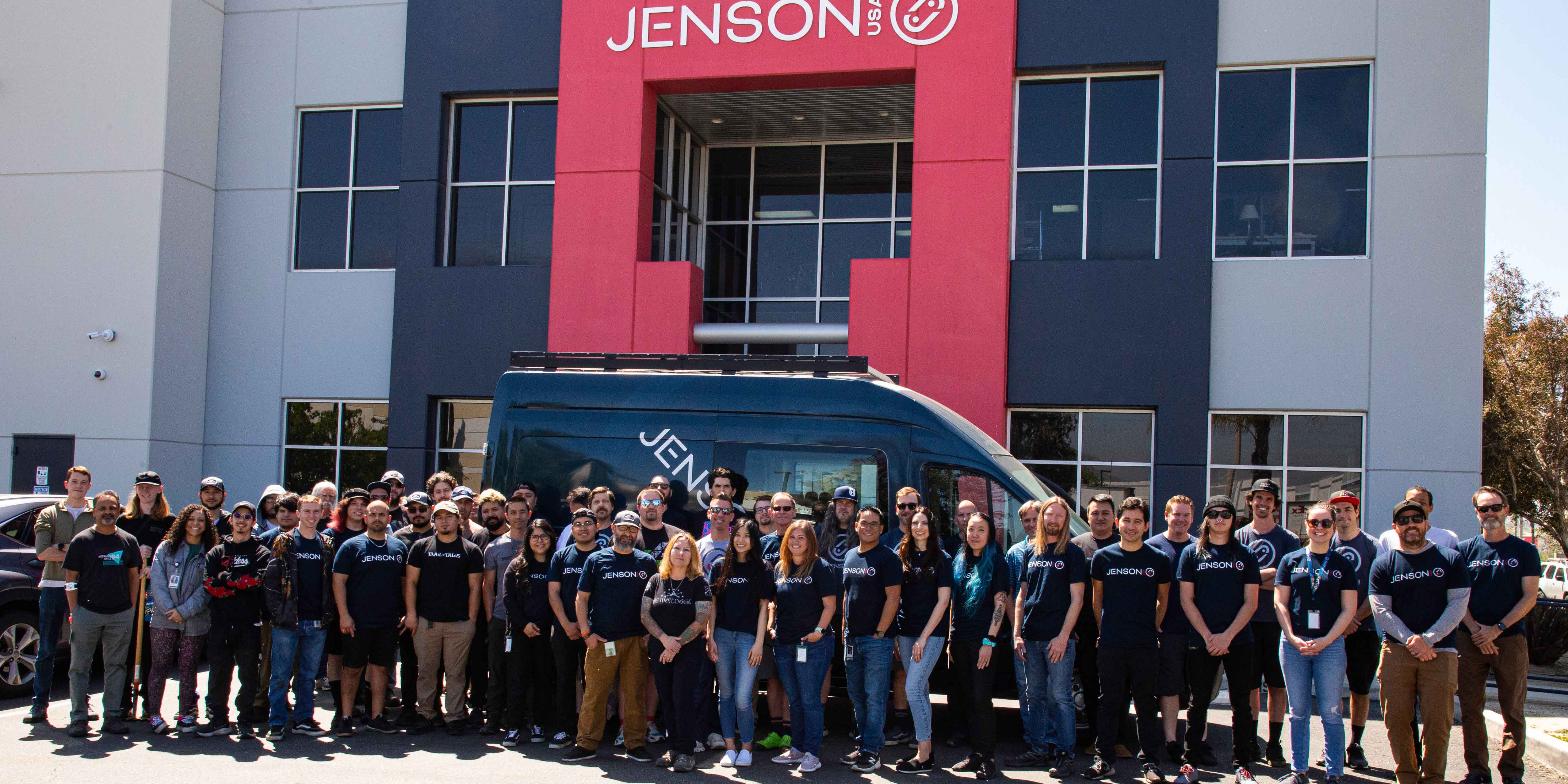 Pic of Jenson Staff in Front of Building